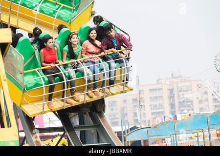 Happy Group Young Friends Riding Roller Coaster Enjoy Amusement Park Stock Photo