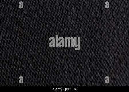 Graphical background, black dotted fabric texture Stock Photo