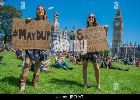 London, UK. 10th June, 2017. A day after the election result protestors gather to ask for Theresa May to quit and not do a deal with the DUP. Who people fear because of their views on abrtion, gay marriage etc. Westminster, London, 10 Jun 2017 Credit: Guy Bell/Alamy Live News Stock Photo