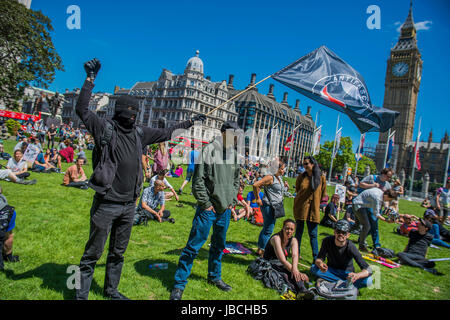 London, UK. 10th June, 2017. A day after the election result protestors gather to ask for Theresa May to quit and not do a deal with the DUP. Who people fear because of their views on abortion, gay marriage etc. Westminster, London, 10 Jun 2017 Credit: Guy Bell/Alamy Live News Stock Photo