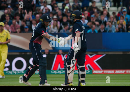 Birmingham, England, 10 June 2017. Ben Stokes, left, congratulating England Captain Eoin Morgan on reaching 50 runs against Australia in the ICC Champions Trophy Group A match at Edgbaston. Credit: Colin Edwards/Alamy Live News.