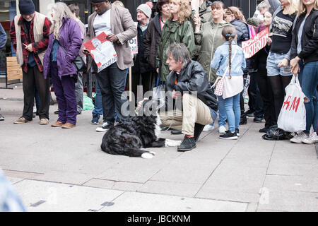 Cardiff, UK. 10th June, 2017. Calling for Conservative Prime Minister Theresa May to resign, in conjunction with other protests taking place across the UK, austerity campaigners gathered under the Aneurin Bevan stature in Cardiff City centre, where there were speeches by activists and a march across Queen Street. Taz Rahman/Alamy Live News Stock Photo