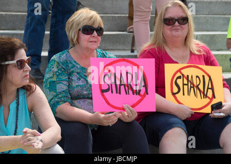 Harrisburg, Pennsylvania, USA. 10th June, 2017. About 50 members of ACT for America rallied on the steps of the Pennsylvania state capitol against Sharia law. ACT for America is the largest anti-Muslim group in the United States, according to the Southern Poverty Law Center. Credit: Jim West/Alamy Live News Stock Photo