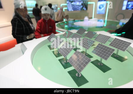 Astana, Kazakhstan. 10th June, 2017. People visit 'A Chinese Wisdom and Practice' section in China Pavilion of the 2017 World Expo in Astana, Kazakhstan, on June 10, 2017. The China Pavilion of the 2017 World Expo opened on Saturday in the Kazakh capital of Astana, which highlights China's achievements in developing, utilizing and protecting new energy. Credit: Lu Jinbo/Xinhua/Alamy Live News Stock Photo