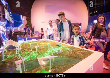 Astana, Kazakhstan. 10th June, 2017. People visit the 'Global Responsibility and Partnership' section in China Pavilion of the 2017 World Expo in Astana, Kazakhstan, on June 10, 2017. The China Pavilion of the 2017 World Expo opened on Saturday in the Kazakh capital of Astana, which highlights China's achievements in developing, utilizing and protecting new energy. Credit: Wu Zhuang/Xinhua/Alamy Live News Stock Photo