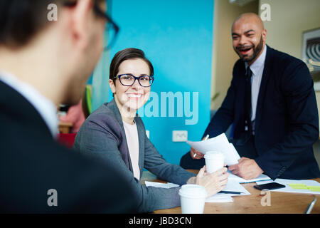 Teamwork of young reporters in studio Stock Photo