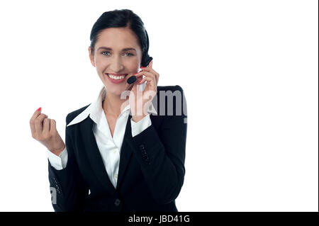 Friendly customer support executive over white Stock Photo