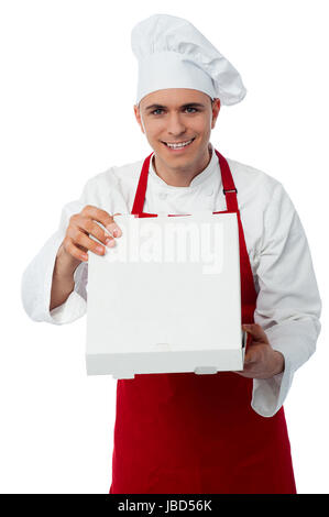 male chef holding a pizza box open Stock Photo