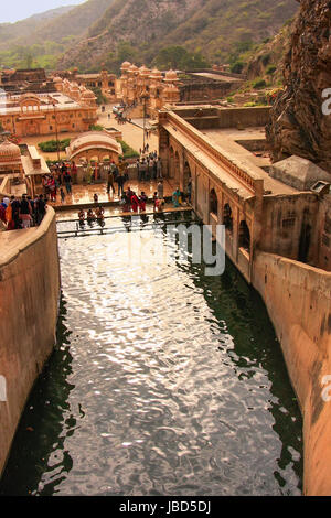 Galtaji Temple near Jaipur, Rajasthan, India. It consists of a series of temples built in to a narrow crevice in the ring of hills that surround Jaipu Stock Photo