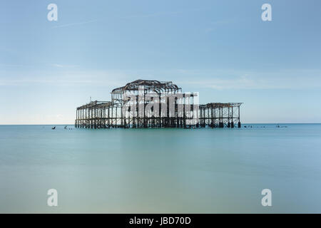 The old West Pier skeleton in calm sea, long exposure, Brighton, UK Stock Photo