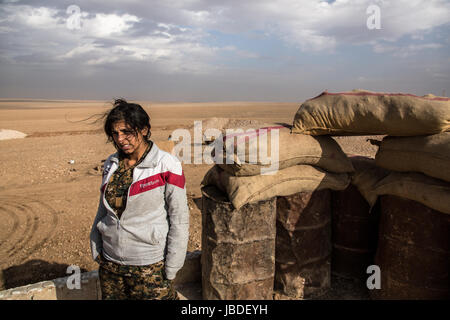 Chris Huby / Le Pictorium -  Syria / Rojava - Wrath of the Euphrates -  23/12/2016  -  Rojava  -  SYRIA ROJAVA  / Portrait of a YPJ soldier for the Raqqa operations. Ain-Issa, zone located a few kms of the jihadist stronghold. A YPJ soldier in the military camp. Stock Photo