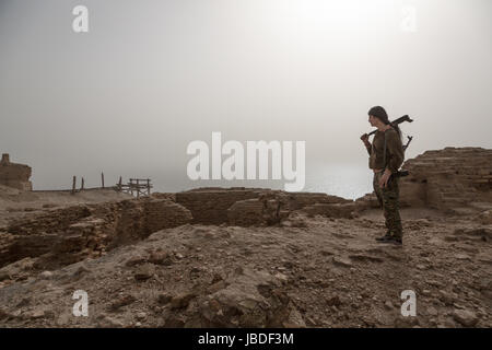 Chris Huby / Le Pictorium -  Syria / Rojava - Wrath of the Euphrates -  07/01/2017  -  Rojava  -  Jan 7- SYRIA ROJAVA / NORTH SYRIA / NEAR RAQQA / QALAT JABAR CASTLE - The SDF (Syrian Democratic Forces) with YPG (kurds) took back the famous castle from ISIS. A YPG soldier is going trough the castle. Stock Photo