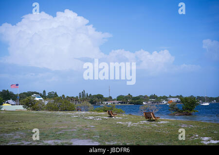 Two empty benches at Indian Mound park in Englewood Florida, i guarantee they won't be empty at sunset. Stock Photo