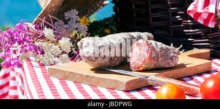 Picnic in french alps with salami Stock Photo
