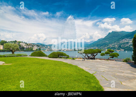 Lugano, Canton Ticino, Switzerland. Lakeside and Lake Lugano on a beautiful summer day Stock Photo