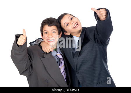 Young boys dressed with a big man's suit Stock Photo