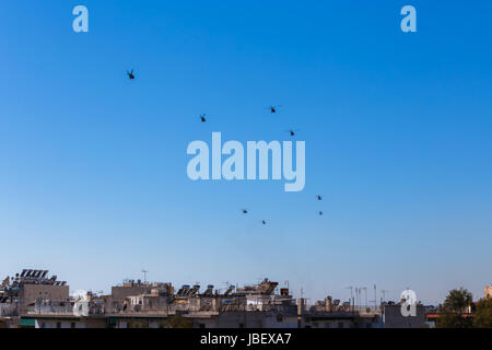 ATHENS, GREECE - MARCH 2017: Helicopters flying in the sky participating on celebrations on the war of independence waged by the Greek revolutionaries Stock Photo