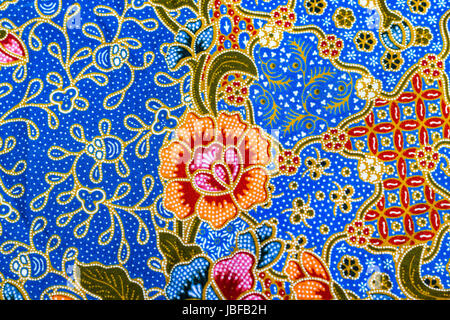  Orange  flowers on batik  fabric Stock Photo 168720006 Alamy