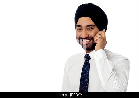 Young Indian professional assisting client Stock Photo