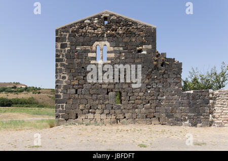 double lancet window in a stone wall. Stock Photo