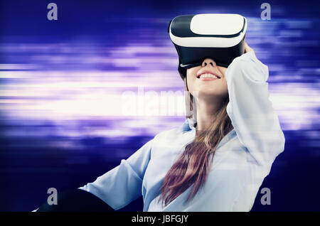 Woman using VR virtual reality glasses. video vr virtual reality games female playing headset concept Stock Photo