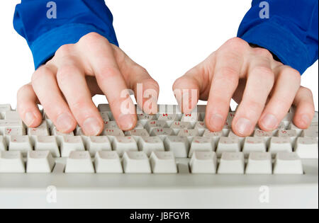 Fingers type a text on the computer keyboard Stock Photo