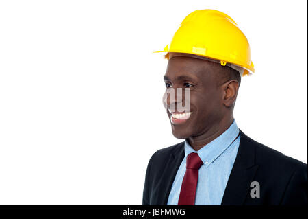 Smiling civil engineer supervising the construction site Stock Photo