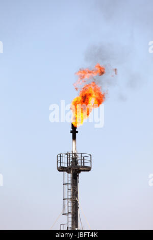 Oil torch in the desert of Bahrain, Middle East Stock Photo