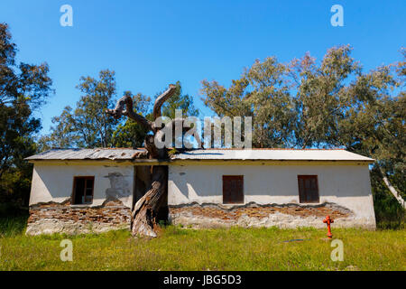 KAIAFAS LAKE, GREECE - APRIL 2017: Abandoned water spa buildings in Kaiafas lake. Kaiafas thermal springs are renowned since antiquity and include spr Stock Photo