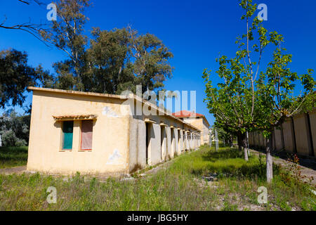 KAIAFAS LAKE, GREECE - APRIL 2017: Abandoned water spa buildings in Kaiafas lake. Kaiafas thermal springs are renowned since antiquity and include spr Stock Photo