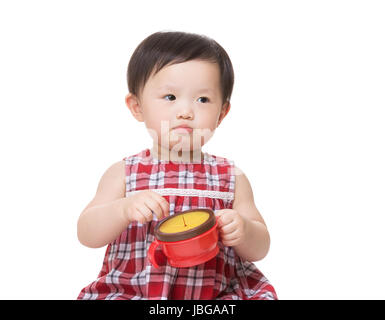 Asia baby girl with snack box and thumb up Stock Photo - Alamy