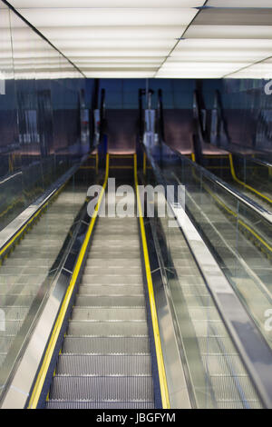 Automatic Stairway with top light in a modern office building in shanghai Stock Photo