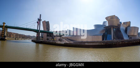 BILBAO, SPAIN, MARCH 7: The Guggenheim Museum in Bilbao, Spain, on March 7, 2014. The Guggenheim is a museum of modern and contemporary art designed by Canadian-American architect Frank Gehry. Stock Photo