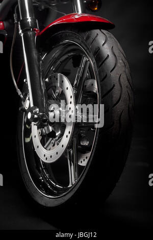 Color shot of a motorcycle forks and tire Stock Photo - Alamy