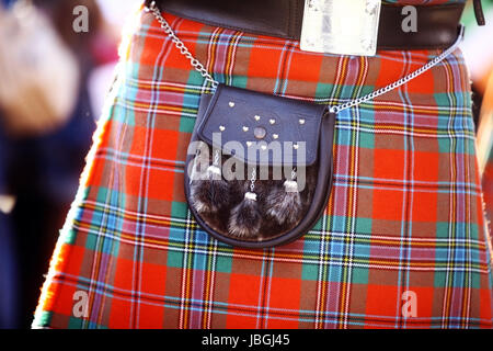 Color detail of a traditional Scottish kilt, with a bag. Stock Photo