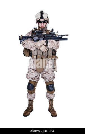US marine with his assault rifle on white background Stock Photo
