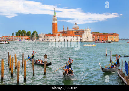 San Giorgio Maggiore island seen from San Marco square in Venice, Italy. Venice is situated across a group of 117 small islands that are separated by  Stock Photo