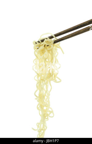 chopsticks holding oriental noodles isolated on a white background Stock Photo