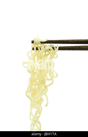 chopsticks holding oriental noodles isolated on a white background Stock Photo