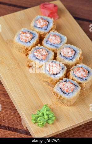 Sushi roll with fresh cream cheese and tobico Stock Photo