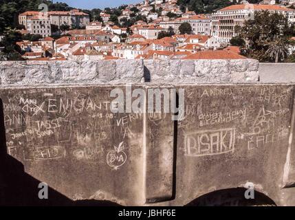 October 5, 2004 - Dubrovnik-Neretva County, Croatia - Disfiguring graffiti on the walls of the historic Old City of Dubrovnik by travelers and tourists. On the Adriatic Sea in southern Croatia, Dubrovnik is a UNESCO World Heritage Site and a top tourist destination. Credit: Arnold Drapkin/ZUMA Wire/Alamy Live News Stock Photo