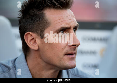 Nuremberg, Germany. 10th June, 2017. Former German national soccer player Miroslav Klose sits on the bench at the World Cup qualifying group C soccer match between Germany and San Marino in Nuremberg, Germany, 10 June 2017. Photo: Sven Hoppe/dpa/Alamy Live News Stock Photo
