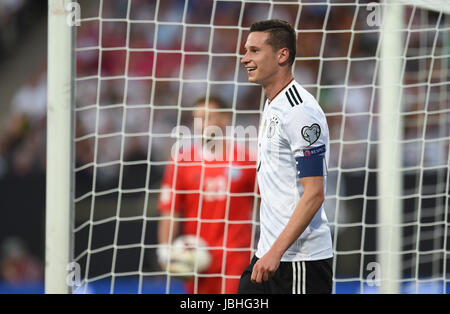 Nuremberg, Germany. 10th June, 2017. Germany's Julian Draxler smiles during the World Cup qualifying group C soccer match between Germany and San Marino in Nuremberg, Germany, 10 June 2017. Photo: Andreas Gebert/dpa/Alamy Live News Stock Photo