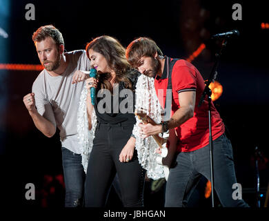 Nashville, Tennessee; USA. 10th June, 2017. Singer CHARLES KELLEY, HILLARY SCOTT and DAVE HAYWOOD of the band Lady Antebellum performs at Nissan Stadium as part of the 2017 CMA Music Festival that is taking place in downtown Nashville. The four day country music festival will attract thousands of fans from around the world to see a variety of artist on multiple stages. Copyright 2017 Jason Moore. Credit: Jason Moore/ZUMA Wire/Alamy Live News Stock Photo