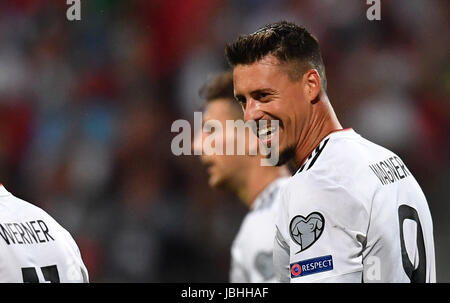 Nuremberg, Germany. 10th June, 2017. Germany's Sandro Wagner smiles during the World Cup qualifying group C soccer match between Germany and San Marino in Nuremberg, Germany, 10 June 2017. Photo: Peter Kneffel/dpa/Alamy Live News Stock Photo