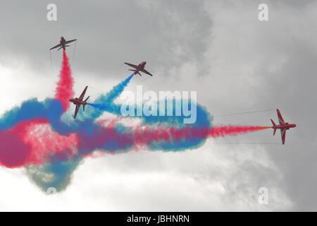 RAF Cosford, Shropshire, UK. 11th June, 2017. The Red Arrows display was one of the highlights of the show Credit: Uwe Deffner/Alamy Live News Stock Photo