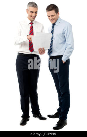 Business colleagues discussing a project reports Stock Photo