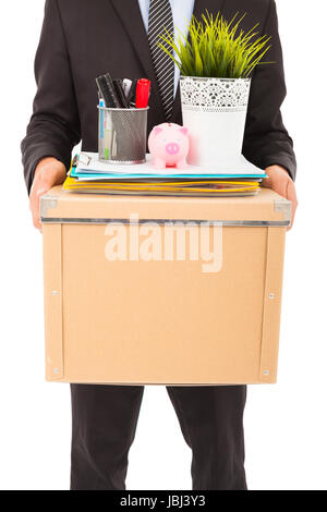 close-up a fired businessman carrying a box Stock Photo