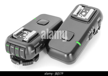 Remote wireless control radio trigger set for studio flash lights isolated on white Stock Photo