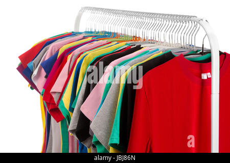 Colored shirts on hangers steel. Isolate on white. Stock Photo
